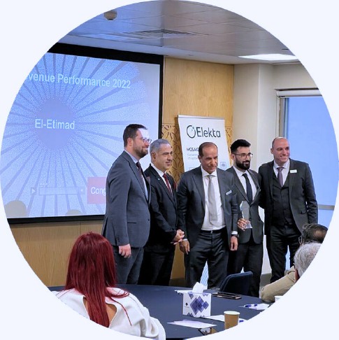 The El-Etimad team receiving an Elekta award